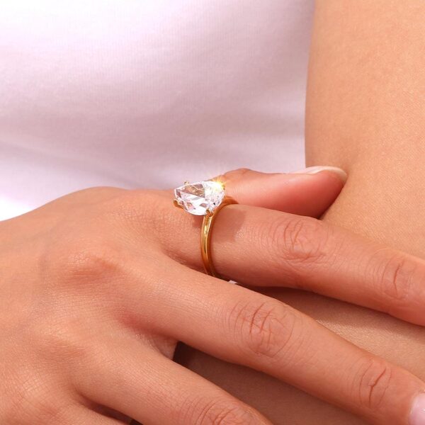 1A69F8B5-8C47-4DB8-9C99-A7E0B397C7DC-1 Pear Diamond Ring