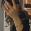 Nail & Cartier Bangle With Ring Stack